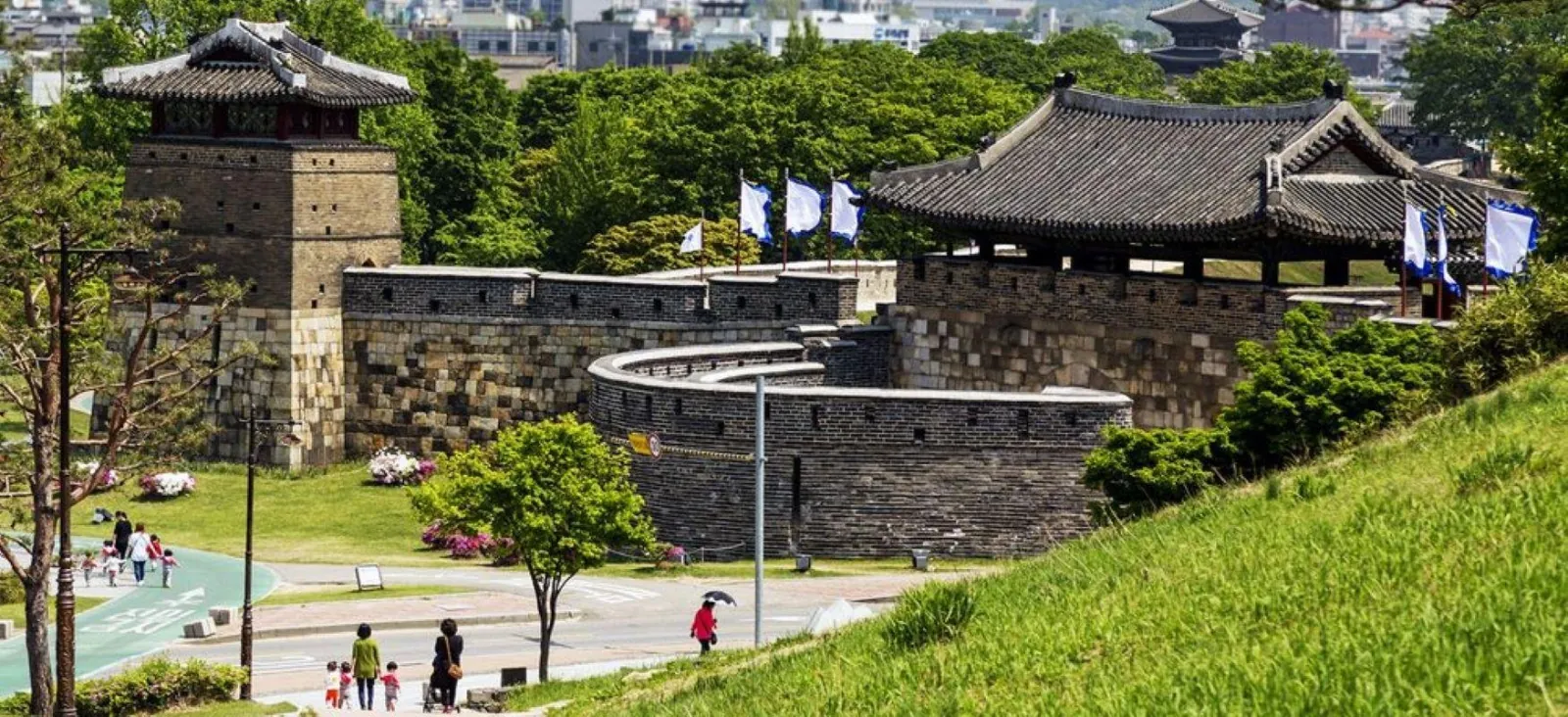 Hwaseong Fortress wall, watchtower and pavilion on a summer afternoon