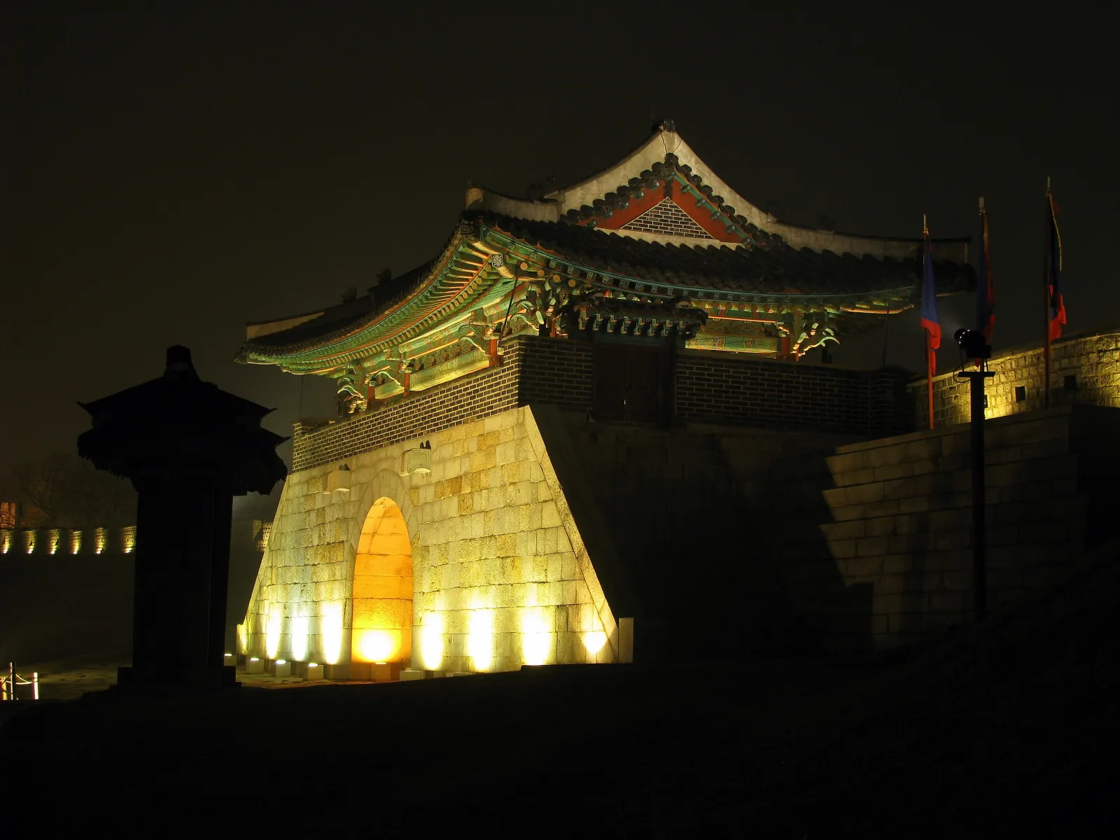 Floodlit gate of Suwon Hwaseong Fortress at night