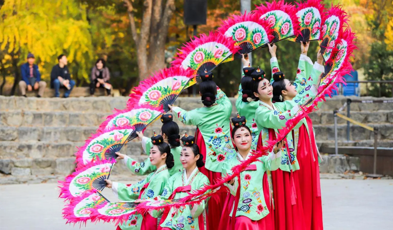 Dancers in hanbok performing the fan dance at the Korean Folk Village