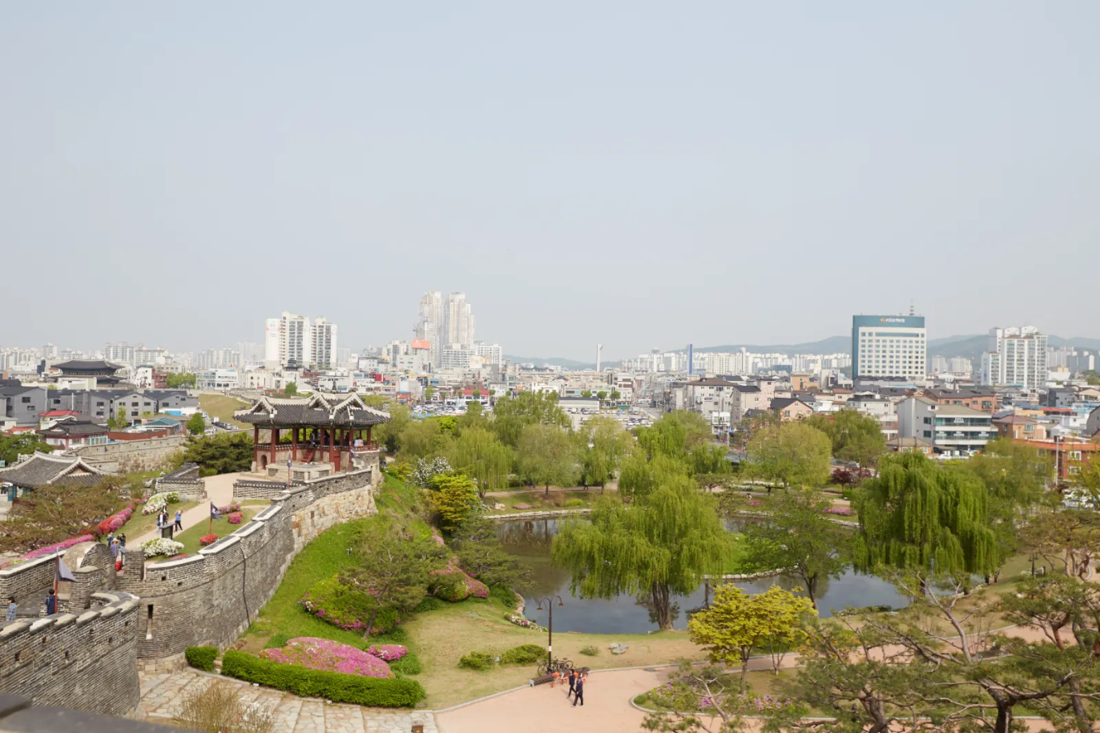 View over Suwon city and the fortress pond from the Hwaseong ramparts