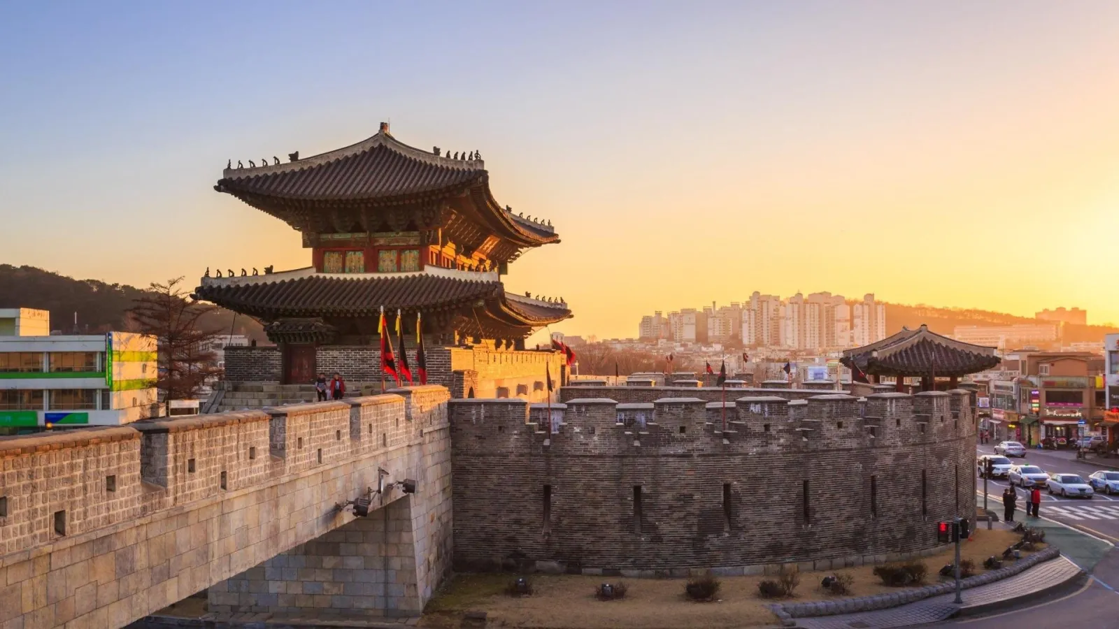 Paldalmun gate and its round barbican wall at sunset in central Suwon