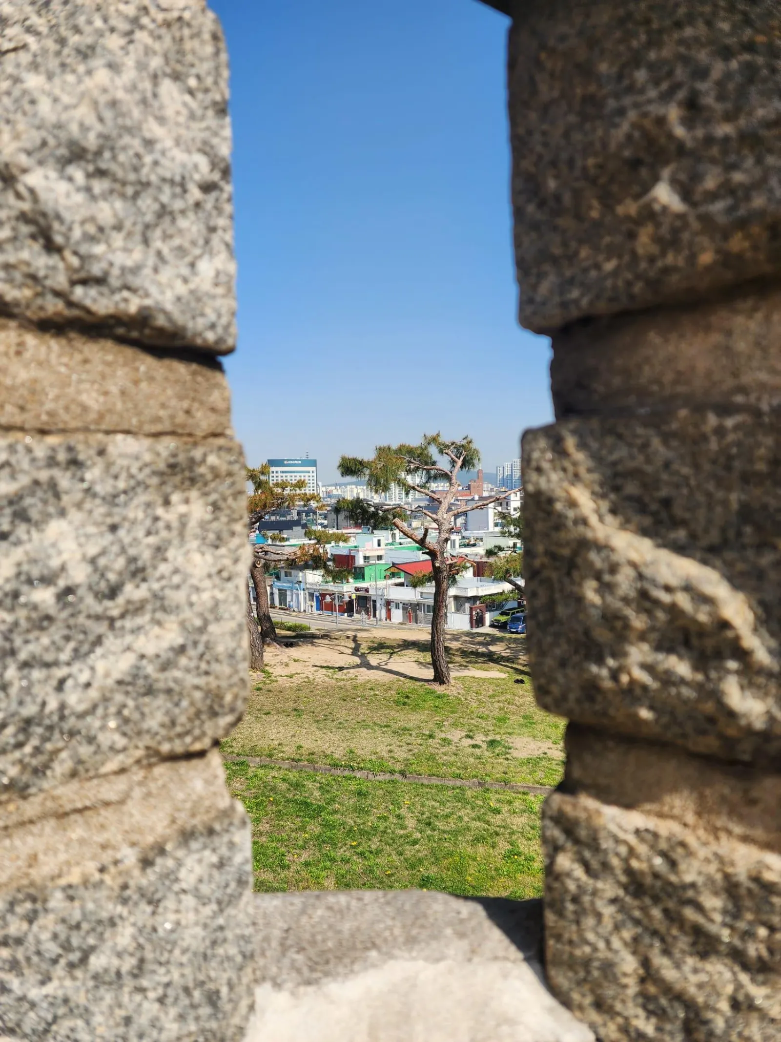 Close view of the cut stone blocks and joints of the Hwaseong Fortress wall
